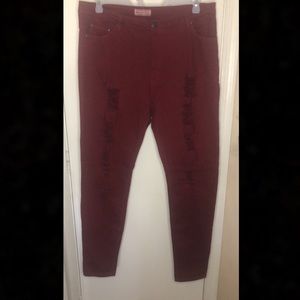 Burgundy-colored skinny jeans with semi-stretch. Worn once or twice.